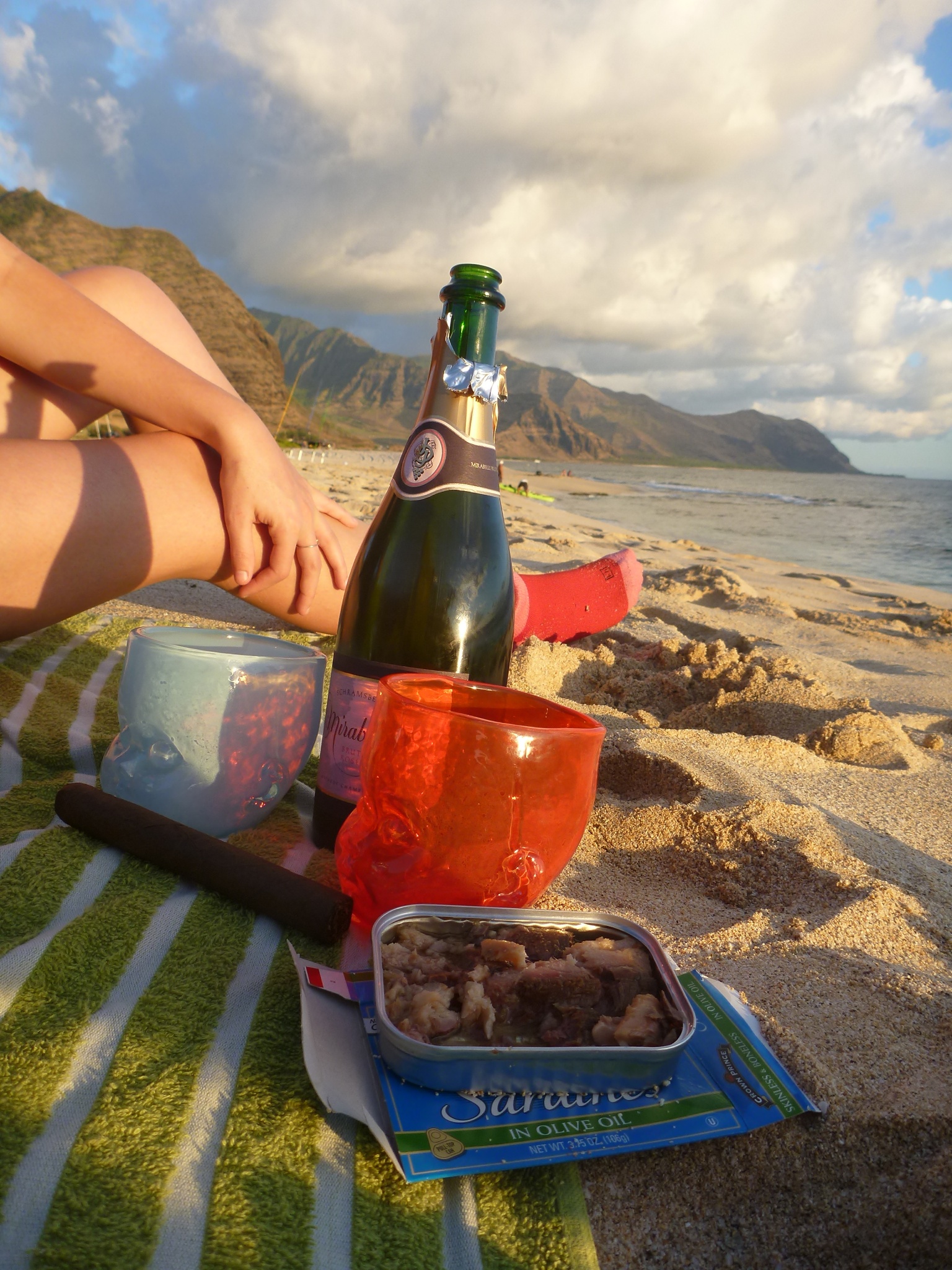 Baby Head Cups on the beach with champagne.