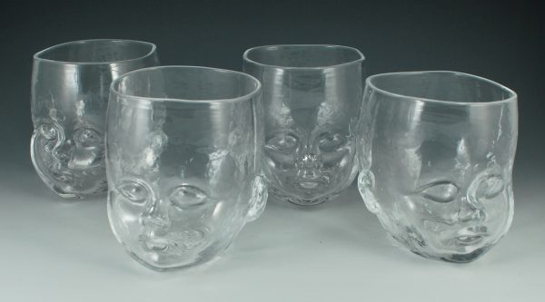 Four Clear baby head Cups