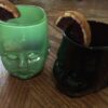 Black and Green Baby Head Cups with Cocktails