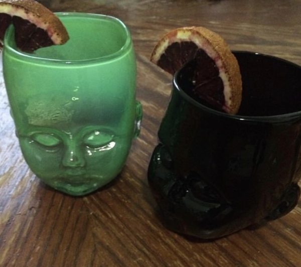 Black and Green Baby Head Cups with Cocktails