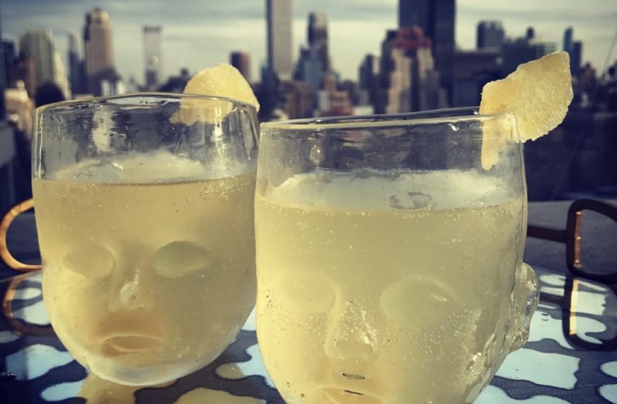 Baby Head Cups filled with cocktails on a rooftop in the city