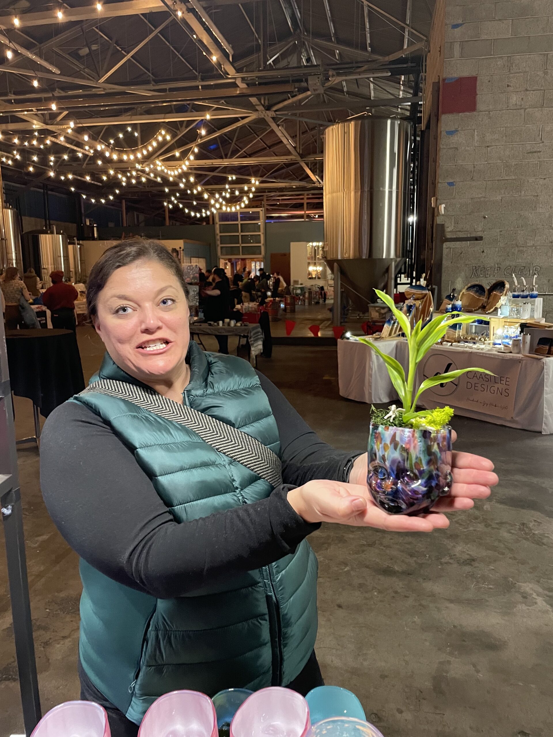 Lady holding a plant