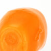 Bottom of an Orange Glass Baby Head Cup by Oliver Doriss