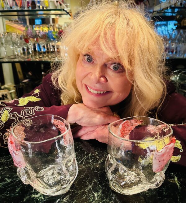Sally Struthers posing with two Cherub Baby Head Cups