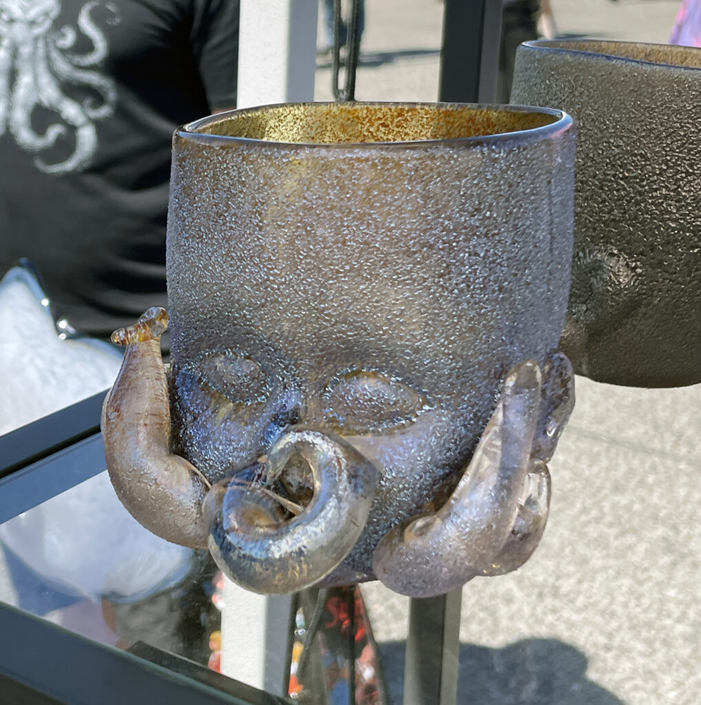 Glass Baby Head Cup in the style of Cthulhu