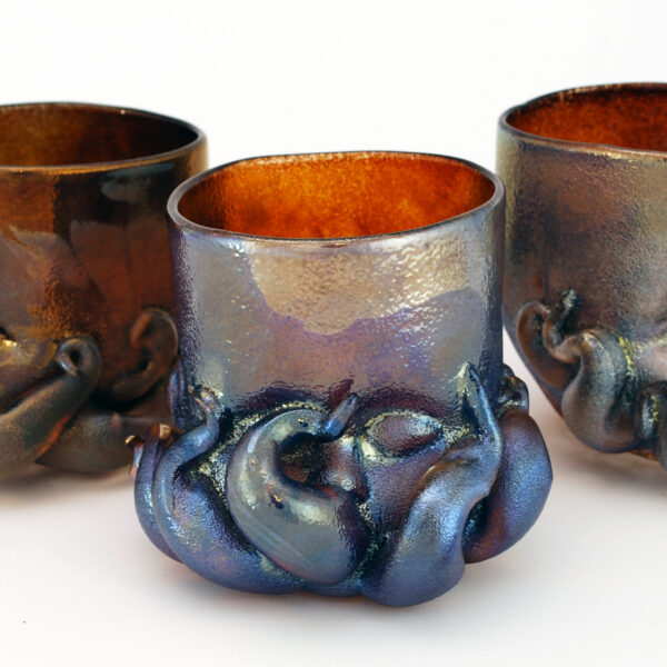Three Glass Baby Head Cups created in the style of H.P. Lovecraft's Cthulhu