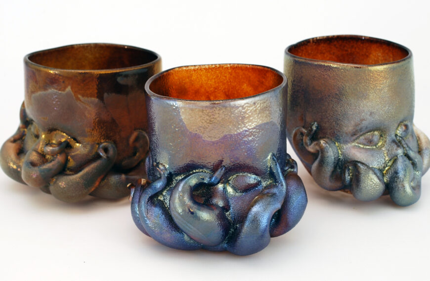 Three Glass Baby Head Cups created in the style of H.P. Lovecraft's Cthulhu