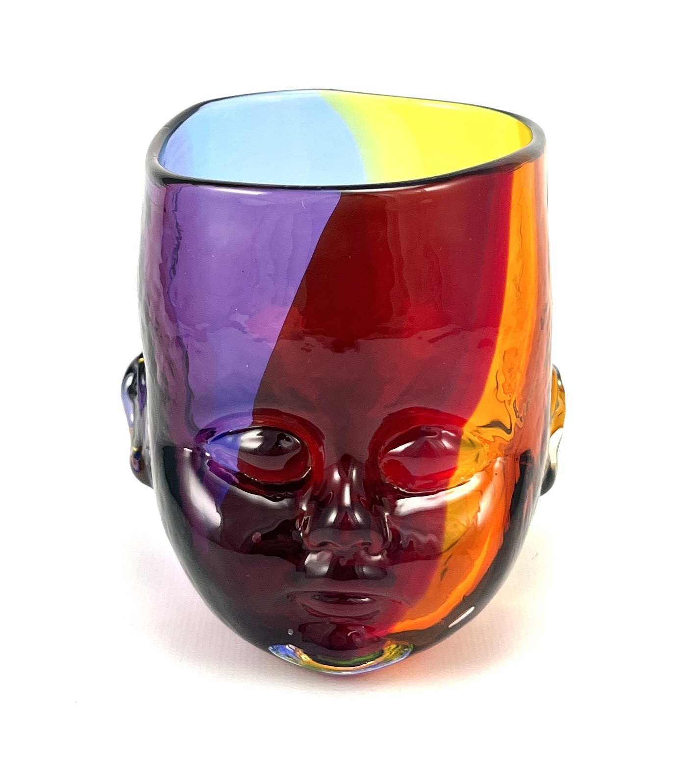 One glass doll head cup rendered in a rainbow colored veil.